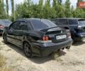Чорний Міцубісі Lancer, об'ємом двигуна 2 л та пробігом 161 тис. км за 4300 $, фото 3 на Automoto.ua