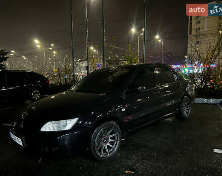 Черный Мицубиси Лансер, объемом двигателя 1.6 л и пробегом 211 тыс. км за 5700 $, фото 16 на Automoto.ua