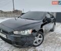 Черный Мицубиси Лансер, объемом двигателя 1.5 л и пробегом 208 тыс. км за 5599 $, фото 1 на Automoto.ua