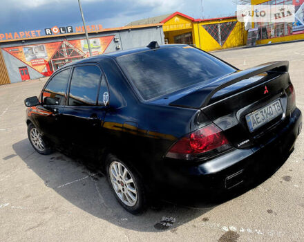 Чорний Міцубісі Lancer, об'ємом двигуна 1.6 л та пробігом 195 тис. км за 5200 $, фото 14 на Automoto.ua