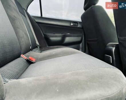 Чорний Міцубісі Lancer, об'ємом двигуна 1.6 л та пробігом 243 тис. км за 4950 $, фото 40 на Automoto.ua