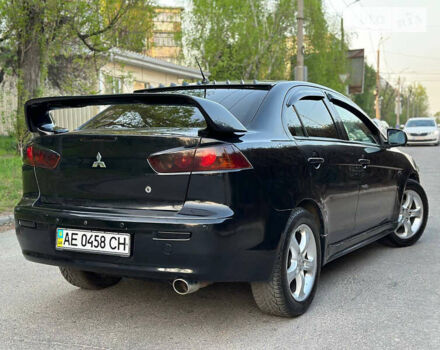 Чорний Міцубісі Lancer, об'ємом двигуна 2 л та пробігом 220 тис. км за 7700 $, фото 3 на Automoto.ua