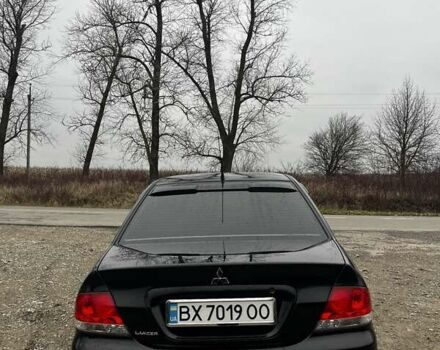 Черный Мицубиси Лансер, объемом двигателя 1.6 л и пробегом 272 тыс. км за 2800 $, фото 1 на Automoto.ua
