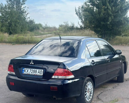 Мицубиси Лансер 2007 в Харькове на Automoto.ua Черный Мицубиси Лансер, объемом двигателя 1.58 л и пробегом 278 тыс. км за 3500 $, фото 5 на Automoto.ua
