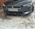 Черный Мицубиси Лансер, объемом двигателя 2 л и пробегом 330 тыс. км за 4600 $, фото 1 на Automoto.ua