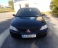 Черный Мицубиси Лансер, объемом двигателя 1.6 л и пробегом 260 тыс. км за 4709 $, фото 1 на Automoto.ua