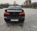 Чорний Міцубісі Lancer, об'ємом двигуна 0.15 л та пробігом 142 тис. км за 7750 $, фото 11 на Automoto.ua