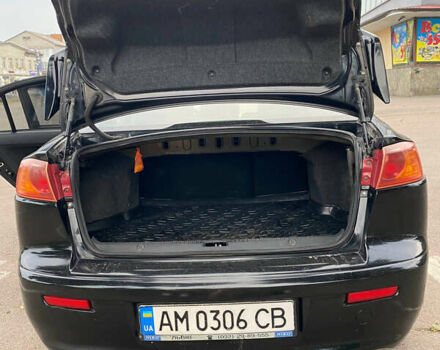 Чорний Міцубісі Lancer, об'ємом двигуна 2 л та пробігом 225 тис. км за 6100 $, фото 4 на Automoto.ua