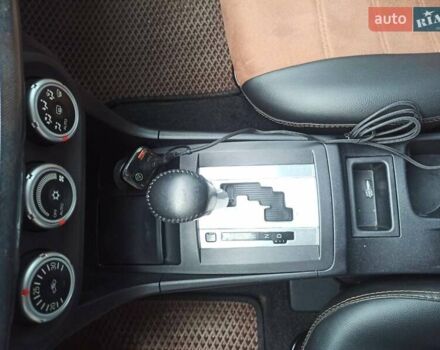 Черный Мицубиси Лансер, объемом двигателя 2 л и пробегом 195 тыс. км за 7899 $, фото 24 на Automoto.ua