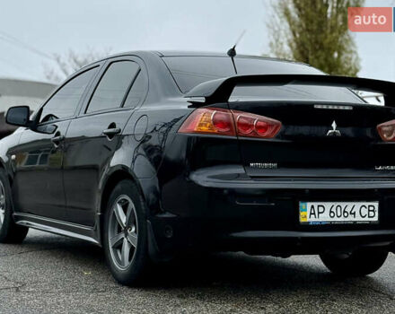 Черный Мицубиси Лансер, объемом двигателя 2 л и пробегом 215 тыс. км за 5500 $, фото 10 на Automoto.ua
