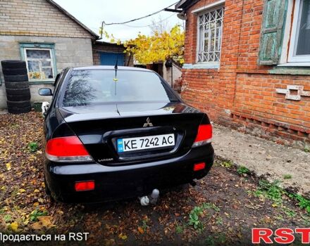 Черный Мицубиси Лансер, объемом двигателя 1.6 л и пробегом 171 тыс. км за 4350 $, фото 2 на Automoto.ua