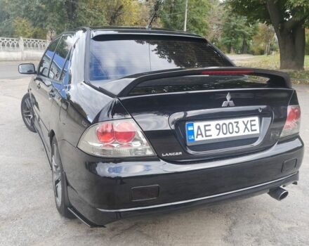 Міцубісі Lancer 2007 у Кам'янське (Дніпродзержинськ) на Automoto.ua Чорний Міцубісі Lancer, об'ємом двигуна 2 л та пробігом 268 тис. км за 5999 $, фото 3 на Automoto.ua