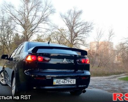 Чорний Міцубісі Lancer, об'ємом двигуна 2 л та пробігом 177 тис. км за 6799 $, фото 6 на Automoto.ua