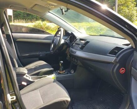 Черный Мицубиси Лансер, объемом двигателя 1.5 л и пробегом 240 тыс. км за 6900 $, фото 9 на Automoto.ua