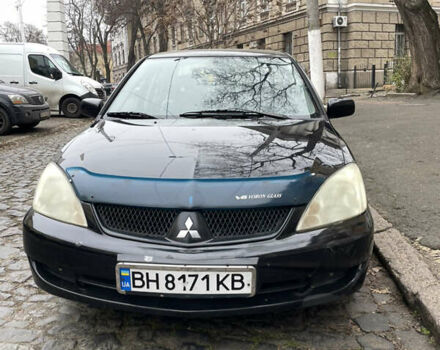 Чорний Міцубісі Lancer, об'ємом двигуна 1.6 л та пробігом 213 тис. км за 3000 $, фото 1 на Automoto.ua
