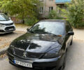 Чорний Міцубісі Lancer, об'ємом двигуна 1.58 л та пробігом 234 тис. км за 3800 $, фото 1 на Automoto.ua