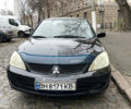 Чорний Міцубісі Lancer, об'ємом двигуна 1.6 л та пробігом 213 тис. км за 3000 $, фото 1 на Automoto.ua