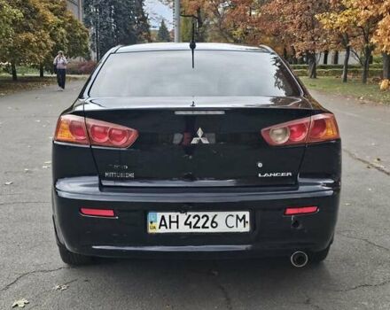 Міцубісі Lancer 2007 у Києві на Automoto.ua Чорний Міцубісі Lancer, об'ємом двигуна 2 л та пробігом 115 тис. км за 5000 $, фото 3 на Automoto.ua
