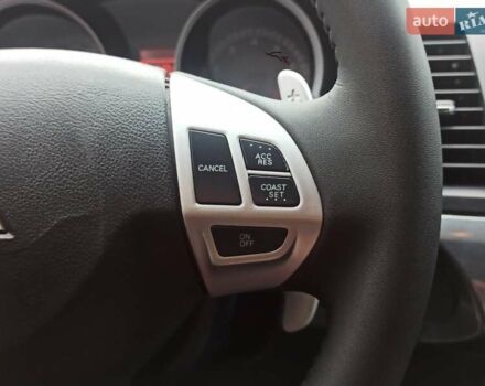 Черный Мицубиси Лансер, объемом двигателя 2 л и пробегом 195 тыс. км за 7899 $, фото 20 на Automoto.ua