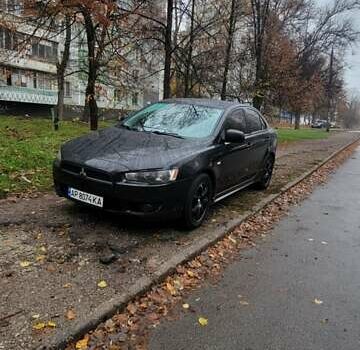 Черный Мицубиси Лансер, объемом двигателя 2 л и пробегом 260 тыс. км за 5500 $, фото 4 на Automoto.ua