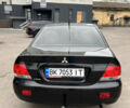 Чорний Міцубісі Lancer, об'ємом двигуна 1.58 л та пробігом 256 тис. км за 4200 $, фото 5 на Automoto.ua