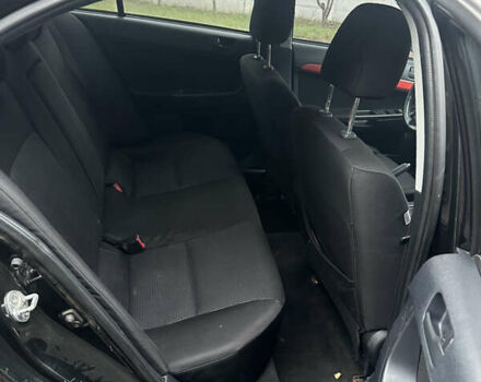Чорний Міцубісі Lancer, об'ємом двигуна 2 л та пробігом 292 тис. км за 4400 $, фото 8 на Automoto.ua