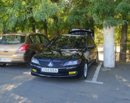 Чорний Міцубісі Lancer, об'ємом двигуна 1.6 л та пробігом 221 тис. км за 4600 $, фото 8 на Automoto.ua