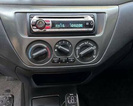 Чорний Міцубісі Lancer, об'ємом двигуна 1.58 л та пробігом 135 тис. км за 4100 $, фото 12 на Automoto.ua