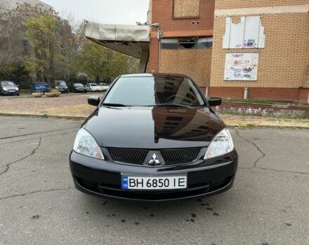 Черный Мицубиси Лансер, объемом двигателя 1.6 л и пробегом 173 тыс. км за 4700 $, фото 7 на Automoto.ua