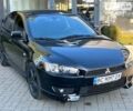 Чорний Міцубісі Lancer, об'ємом двигуна 2 л та пробігом 215 тис. км за 6400 $, фото 2 на Automoto.ua