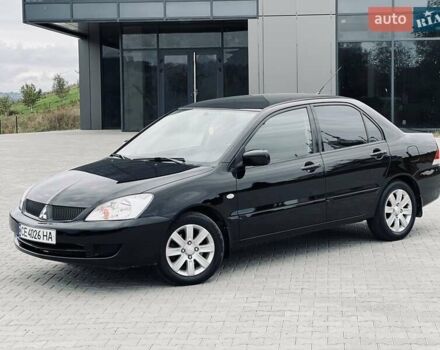 Чорний Міцубісі Lancer, об'ємом двигуна 1.6 л та пробігом 243 тис. км за 4950 $, фото 3 на Automoto.ua