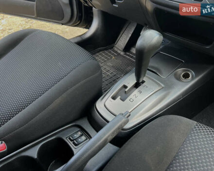 Чорний Міцубісі Lancer, об'ємом двигуна 1.58 л та пробігом 185 тис. км за 3750 $, фото 15 на Automoto.ua