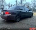 Черный Мицубиси Лансер, объемом двигателя 1.6 л и пробегом 201 тыс. км за 4000 $, фото 1 на Automoto.ua