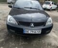 Черный Мицубиси Лансер, объемом двигателя 1.6 л и пробегом 349 тыс. км за 3499 $, фото 1 на Automoto.ua