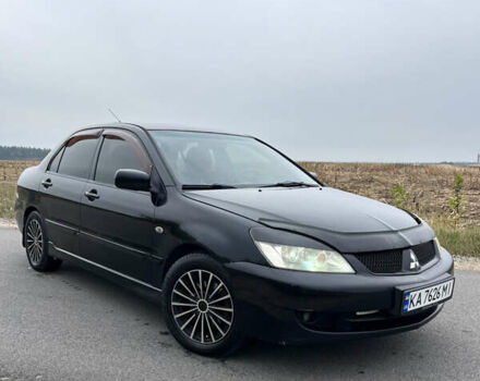 Чорний Міцубісі Lancer, об'ємом двигуна 1.6 л та пробігом 212 тис. км за 4700 $, фото 1 на Automoto.ua
