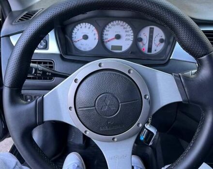 Черный Мицубиси Лансер, объемом двигателя 2 л и пробегом 280 тыс. км за 5400 $, фото 12 на Automoto.ua