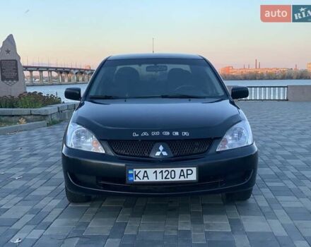 Чорний Міцубісі Lancer, об'ємом двигуна 1.58 л та пробігом 237 тис. км за 4300 $, фото 5 на Automoto.ua