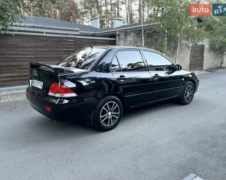 Черный Мицубиси Лансер, объемом двигателя 1.58 л и пробегом 278 тыс. км за 4800 $, фото 2 на Automoto.ua