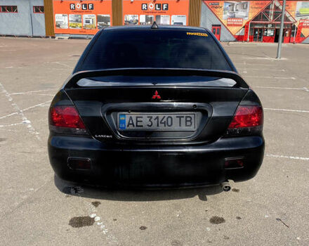 Чорний Міцубісі Lancer, об'ємом двигуна 1.6 л та пробігом 195 тис. км за 5200 $, фото 5 на Automoto.ua