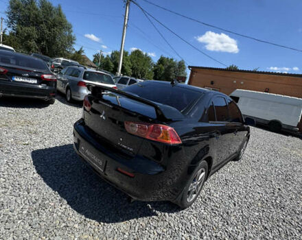Чорний Міцубісі Lancer, об'ємом двигуна 2 л та пробігом 253 тис. км за 6400 $, фото 3 на Automoto.ua