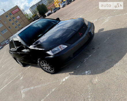 Чорний Міцубісі Lancer, об'ємом двигуна 1.6 л та пробігом 195 тис. км за 5200 $, фото 16 на Automoto.ua