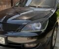 Чорний Міцубісі Lancer, об'ємом двигуна 1.6 л та пробігом 240 тис. км за 4004 $, фото 1 на Automoto.ua