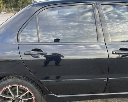 Чорний Міцубісі Lancer, об'ємом двигуна 2 л та пробігом 280 тис. км за 4600 $, фото 28 на Automoto.ua