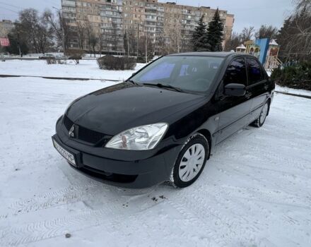 Чорний Міцубісі Lancer, об'ємом двигуна 1.6 л та пробігом 260 тис. км за 3999 $, фото 1 на Automoto.ua