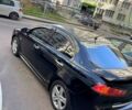 Чорний Міцубісі Lancer, об'ємом двигуна 2 л та пробігом 1 тис. км за 6600 $, фото 1 на Automoto.ua