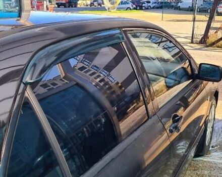 Черный Мицубиси Лансер, объемом двигателя 1.6 л и пробегом 185 тыс. км за 3300 $, фото 7 на Automoto.ua