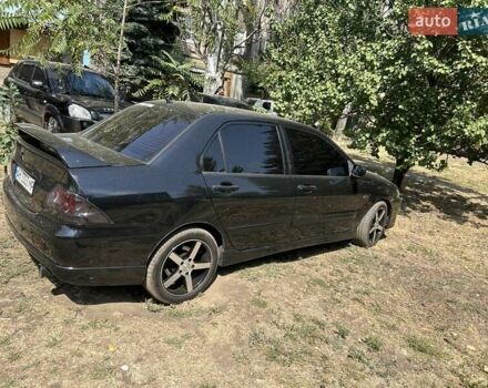 Мицубиси Лансер 2007 в Краматорске на Automoto.ua Черный Мицубиси Лансер, объемом двигателя 2 л и пробегом 193 тыс. км за 6250 $, фото 6 на Automoto.ua