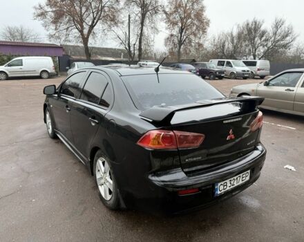 Черный Мицубиси Лансер, объемом двигателя 2 л и пробегом 281 тыс. км за 6000 $, фото 6 на Automoto.ua