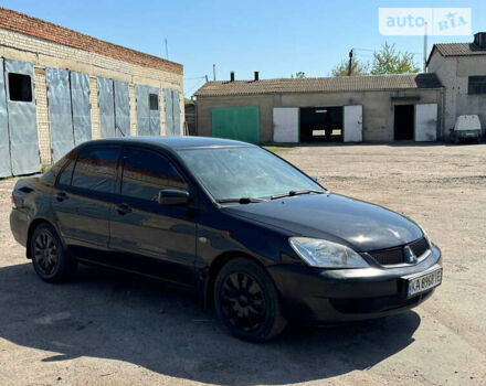 Чорний Міцубісі Lancer, об'ємом двигуна 1.6 л та пробігом 220 тис. км за 4000 $, фото 3 на Automoto.ua