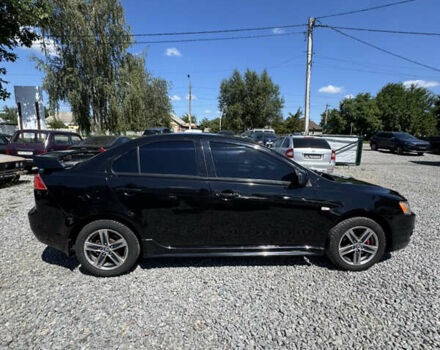 Чорний Міцубісі Lancer, об'ємом двигуна 2 л та пробігом 253 тис. км за 6400 $, фото 2 на Automoto.ua